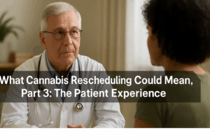 A professional, high-resolution photograph shows an older male doctor with short white hair and glasses, wearing a lab coat and stethoscope, attentively listening to a female patient with short curly dark hair. They are seated in a softly lit medical office with neutral tones and a plant in the background. Across the foreground, a black translucent banner displays the text: "What Cannabis Rescheduling Could Mean, Part 3: The Patient Experience."